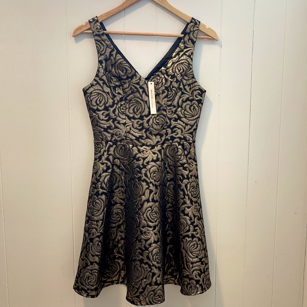 Beautiful fit and flare dress gold metallic embroidery detail!
